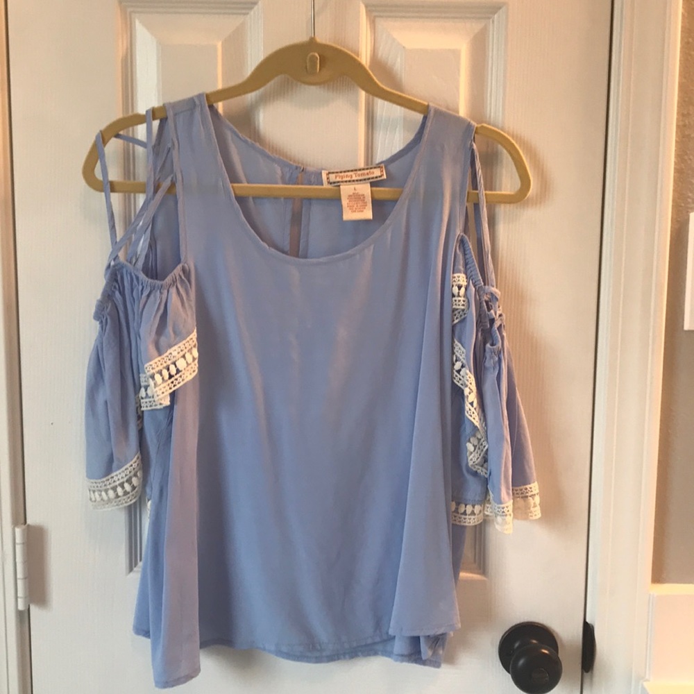 Light blue cut out shoulder top. Size L